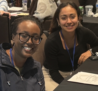 two students facing camera