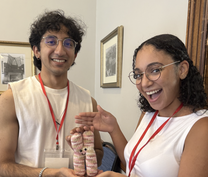 Two scholars with DNA helix